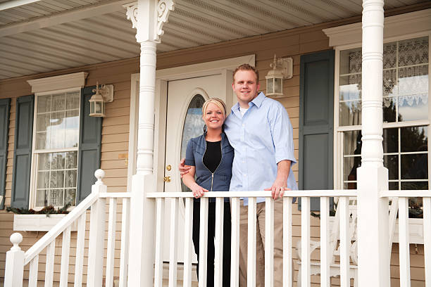 istock Young Couple Standing on Porch 172296535