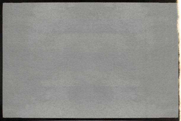 skenování prázdného nebo prázdného 16mm filmového rámečku s vysokým rozlišením s černým okrajem a únikem světla. - dlouhá expozice fotky - stock snímky, obrázky a fotky