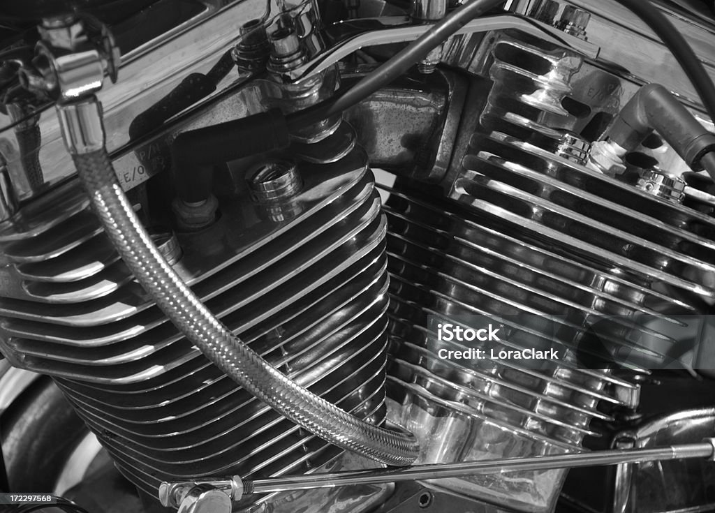 Chrome Camshafts Motorbike engine close-up of twin chrome camshafts Engine Stock Photo