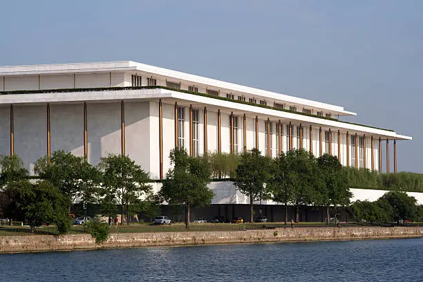 Kennedy Center or John F. Kennedy Memorial Center for the Performing Arts by the Potomac river in Washington DC