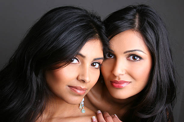 Two gorgeous East Indian sisters.