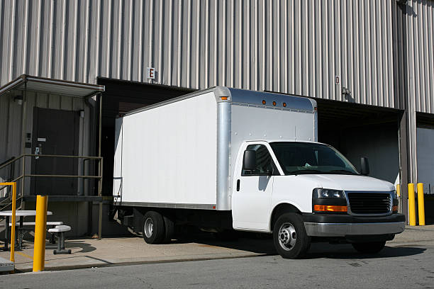 An image of a white delivery truck stock photo