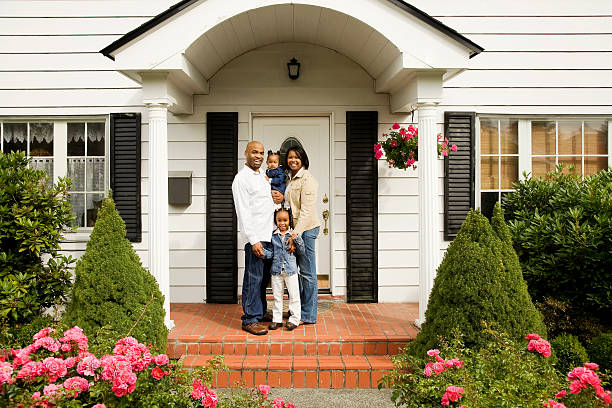 istock Young Family on Front Porch 172299785