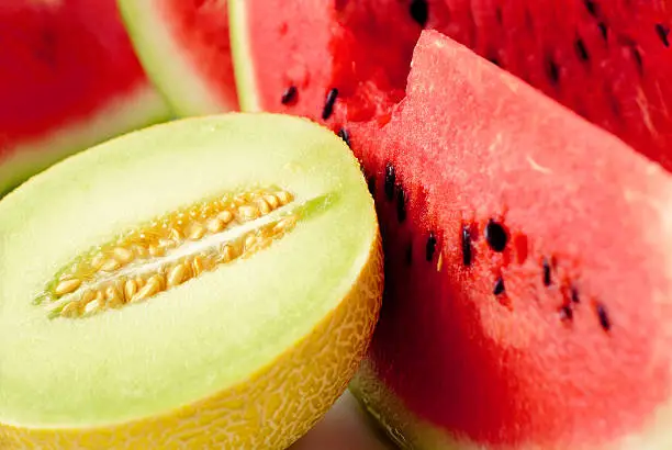 Photo of Close up of sliced melon and watermelon
