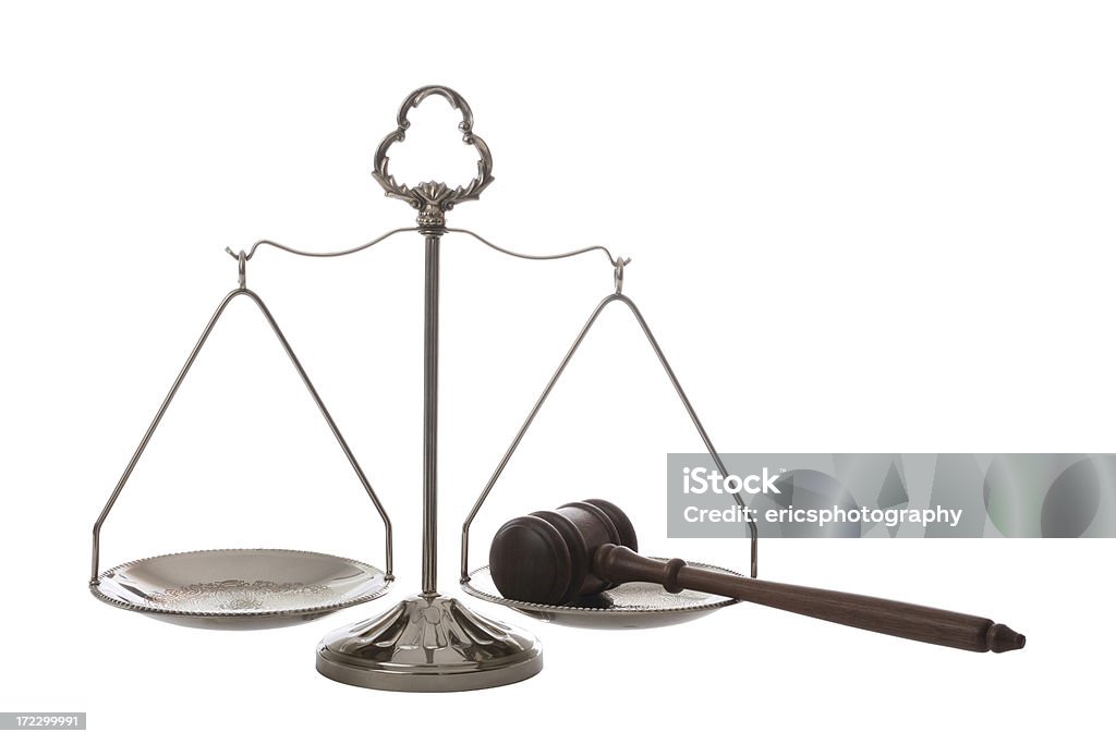 Gavel on Scales of Justice Gavel on Scales of Justice. Extracted on white. Equal-Arm Balance Stock Photo