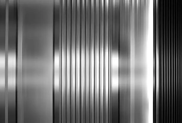 Photo of Abstract background of vertical stainless steel panels