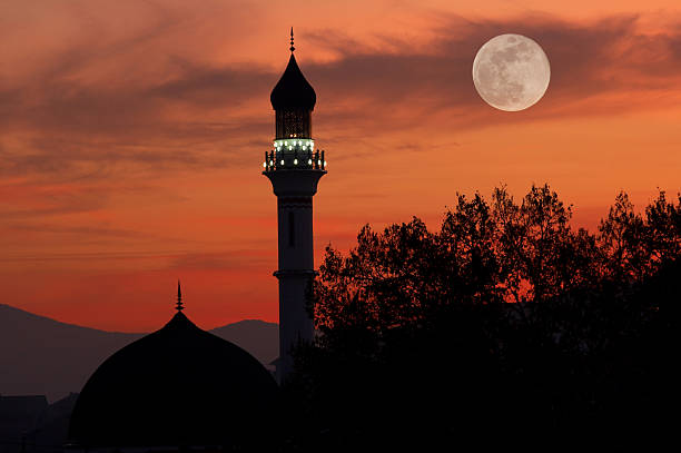 istock Mosque at dusk with full moon 172300088