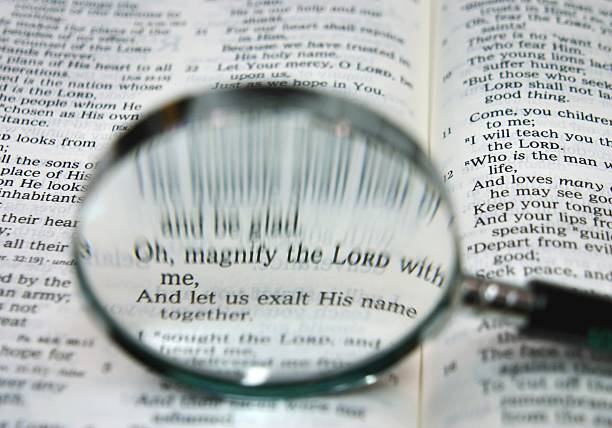 istock Religious: Bible scripture of Magnify the Lord with magnifying glass 172300381