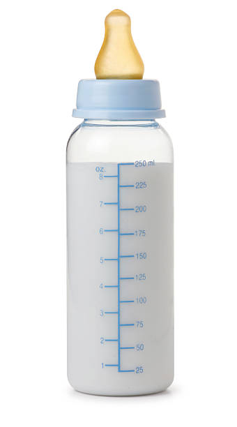 Baby Bottle Baby bottle on white with soft shadow baby bottle stock pictures, royalty-free photos & images
