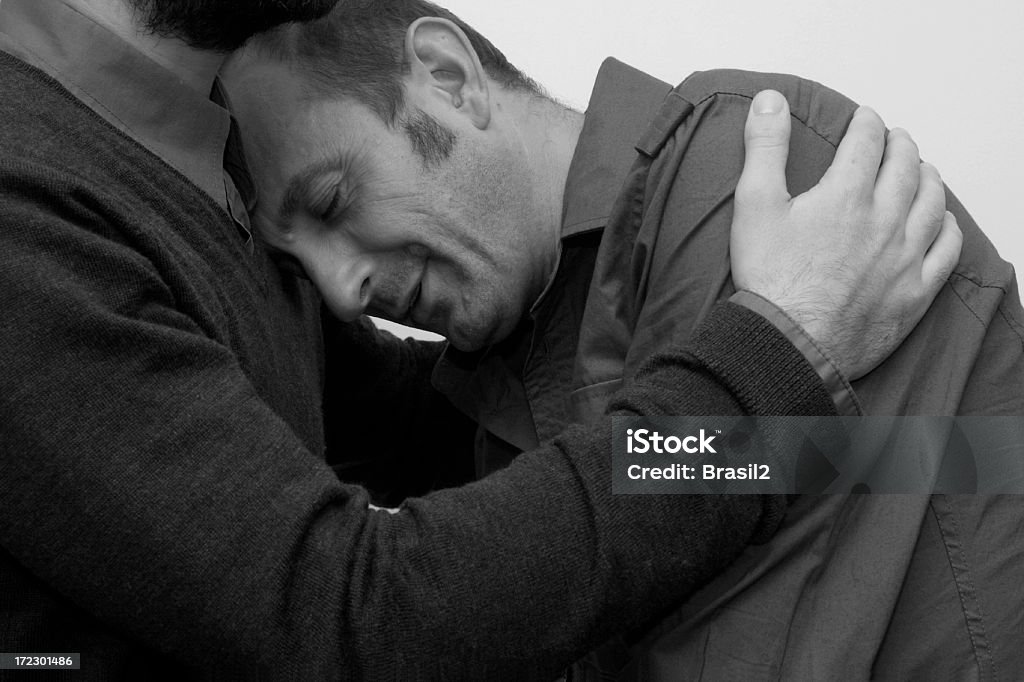 Il dolore - Foto stock royalty-free di Abbracciare una persona
