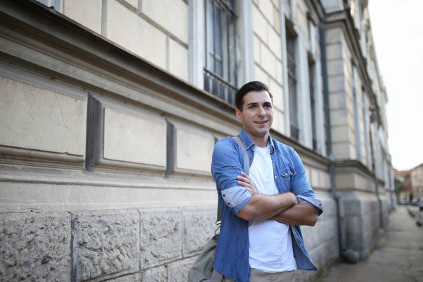 istock Charming man with backpack in city stock photo 1723015447