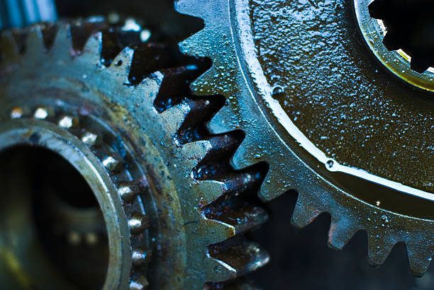 Close up of greasy and oily gears stock photo