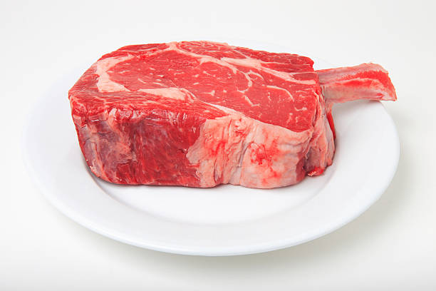 istock Raw Cowboy Ribeye 7 (White Plate) 172302411