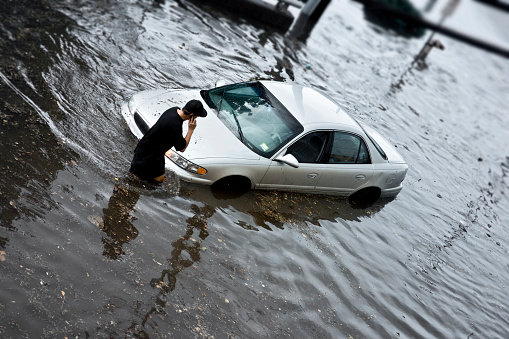 Auto Stuck in Flood Waters.more images from the