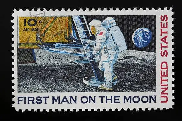 Photo of Vintage First man on the moon stamp, ten cents