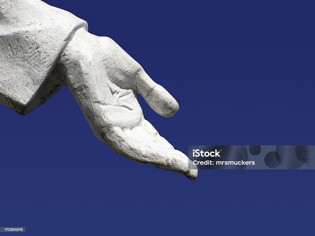 Helfende Hand Gottes gegen strahlend blauem Himmel - Lizenzfrei Christentum Stock-Foto