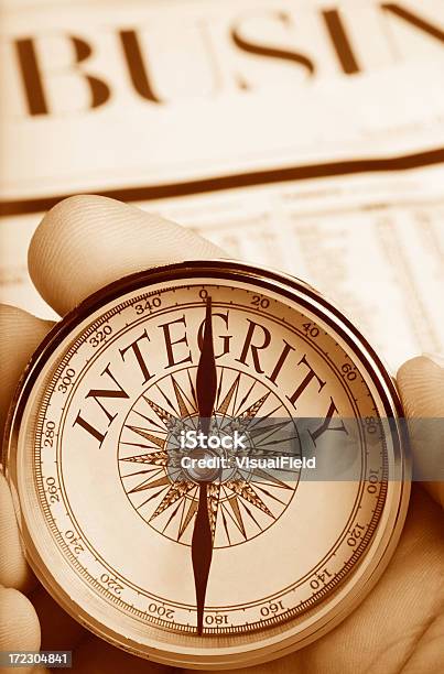 Compass Pointing The Way To Integrity In Business Stock Photo - Download Image Now - Morality, Navigational Compass, Advice