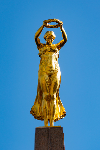 Statue of the Republic, also known as Mariann, on Place de la République in Jonzac. The monument was inaugurated in 1894 and created by the sculptor Gustave Frédéric Michel (1851–1924) for the centenary of the Revolution. The The sculpture is similar to the Statue of Liberty: Jonzac, France