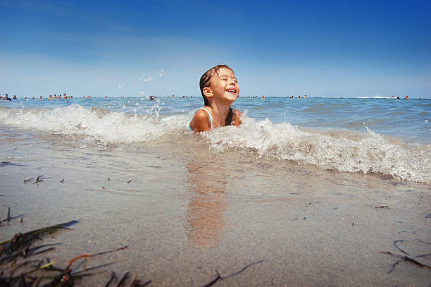 Beach frolicking fun in the surf