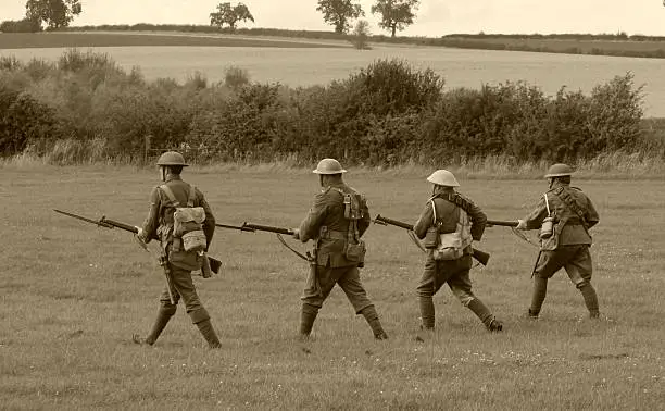 Tommies advance in sepia.