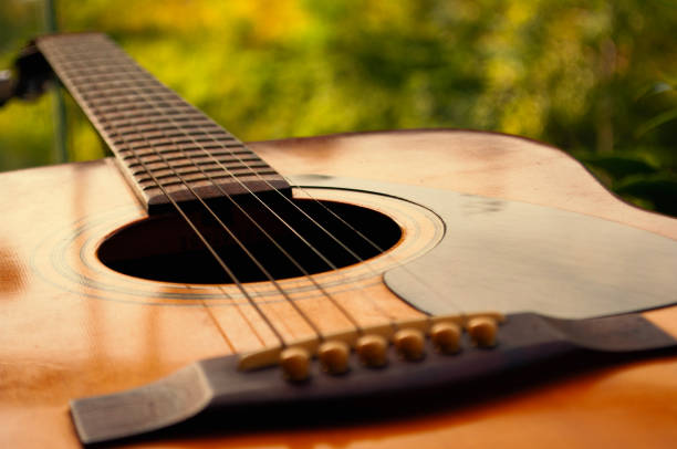istock Close up of Guitar with nature background. Customizable space for text or ideas. Copy space. 1723061516