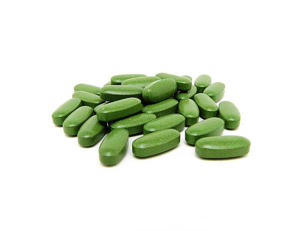 istock Big Green Pills Isolated on A White Background 172306201
