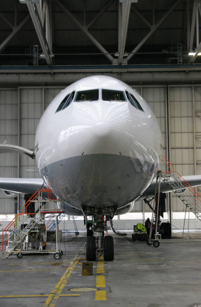 istock Airliner in hangar for maintenance 172306635