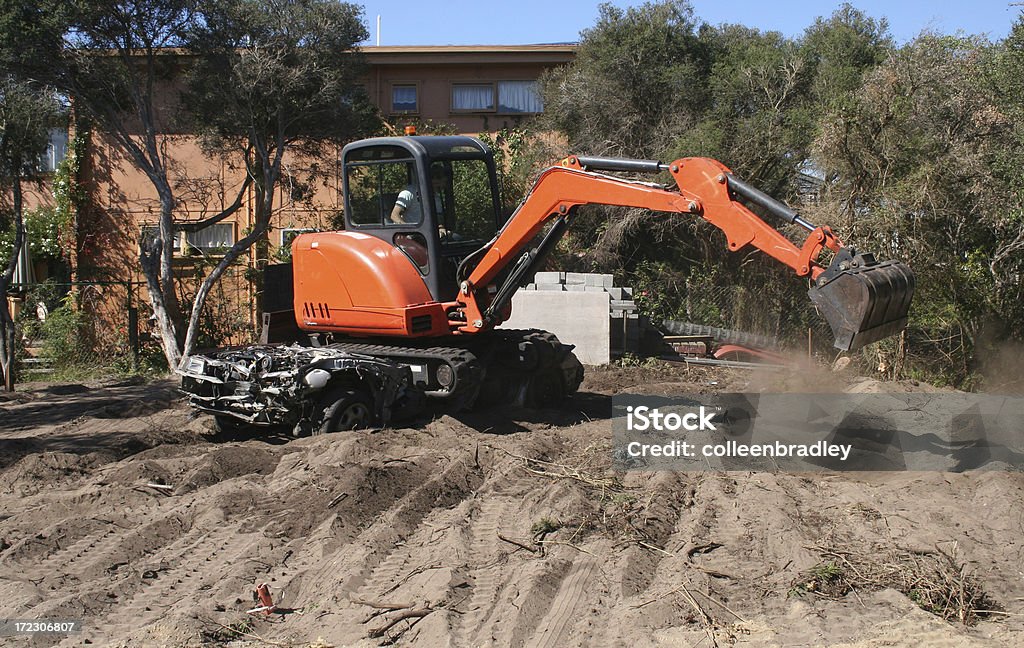 土地と掘る Excavator 解除 - ショベルローダーのロイヤリティフリーストックフォト
