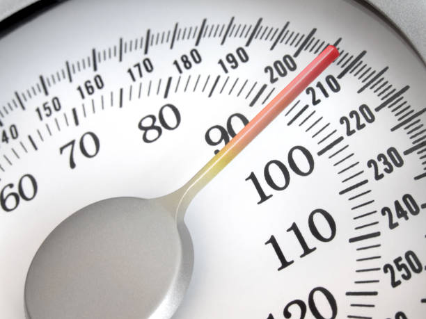 istock Close up of a scale with a heavy weight 172306825