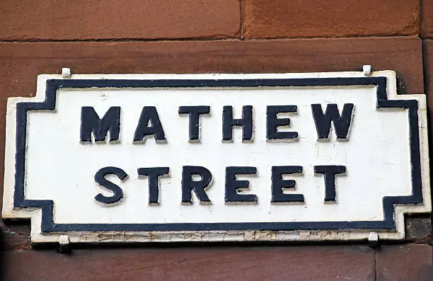 Mathew Street sign in Liverpool (Matthew is incorrect spelling in this case). Location of the Cavern Club where the Beatles played in the early 1960s.