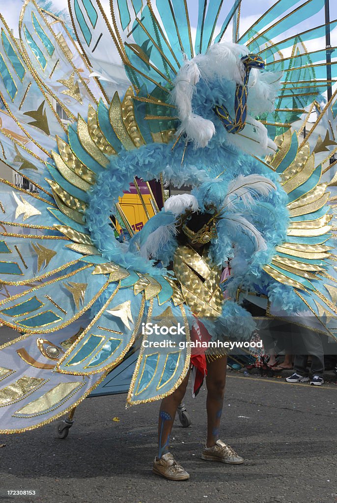 Woman in a carnival parade as a blue peacock  One of the many flamboyant costumes at the Notting Hill Carnival, London Notting Hill Carnival Stock Photo