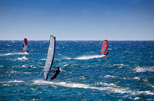 istock Trio of Windsurfers 172308701