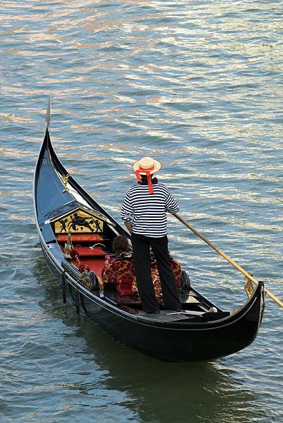 venetian gondoliere - men gondolier people activity stock-fotos und bilder