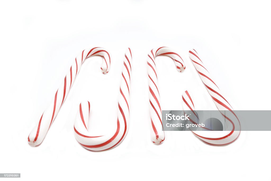 Cuatro candy canes. - Foto de stock de Caramelo duro libre de derechos