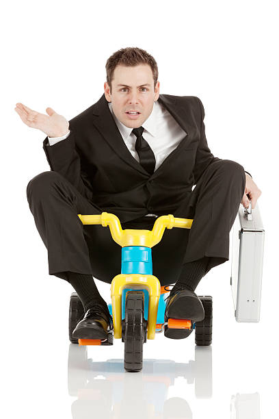 biznesmen na trycykl - tricycle full length men bizarre zdjęcia i obrazy z banku zdjęć