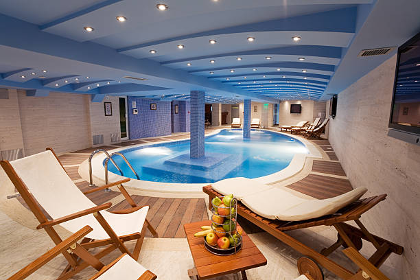 A view of a luxury pool with seating stock photo
