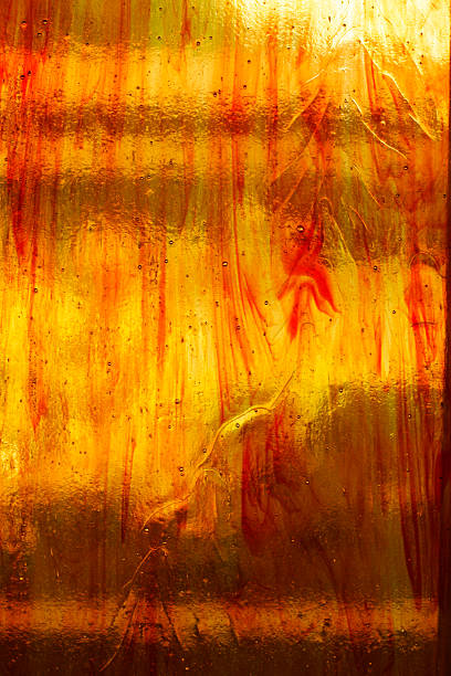 rosso in vetro colorato arancione - stained glass glass art church foto e immagini stock