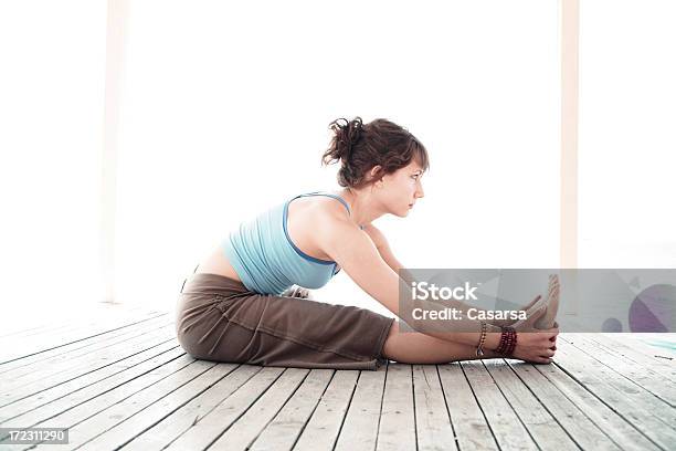 Yoga Paschimottanasana Stock Photo - Download Image Now - 20-24 Years, Adult, Adults Only