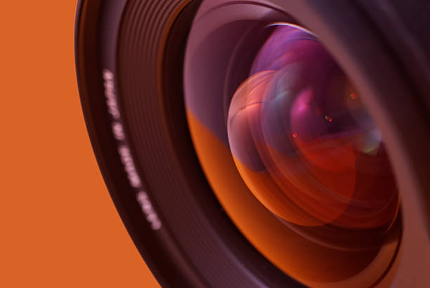 Macro camera lens,Close-up camera lens,Photo Camera or Video lens close-up on black background, objective, concept of photographer camera man job, looking for a photographer,