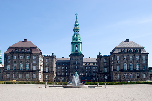 Christiansborg Palace on Slotsholmen in central Copenhagen is the home of Denmark's three supreme powers: the executive power, the legislative power, and the judicial power.