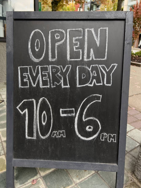 istock Handwritten Chalk Open Every Day and Hours Sandwich Board Sign 1723133886