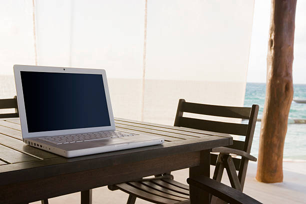 istock Beautiful Empty Beach Hotel Suite with Laptop on Table, Copyspace 172314352