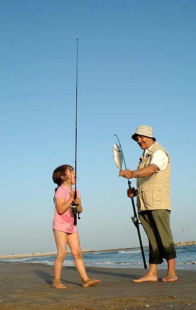 big jeden - fishing rod fishing fishing reel casting zdjęcia i obrazy z banku zdjęć