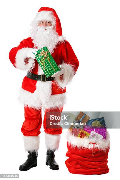 Santa Con Regali Su Bianco - Fotografie stock e altre immagini di Babbo Natale - Babbo Natale, Adulto, Adulto in età matura