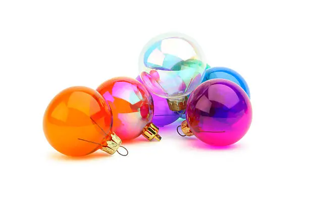 Vivid coloured baubles with its own shadows.