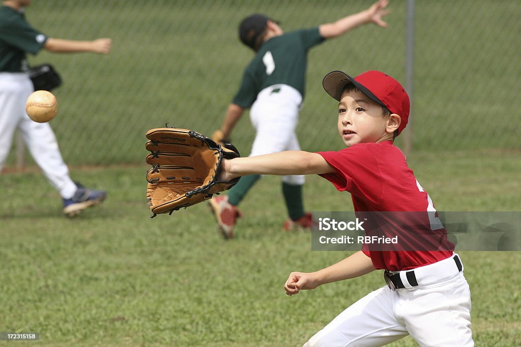 Baseball a youth league baseball player Baseball - Ball Stock Photo