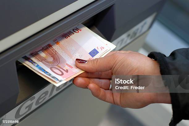 Getting Money Stock Photo - Download Image Now - ATM, Currency, European Union Currency