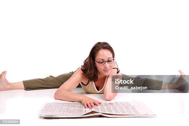 Reading The Paper Stock Photo - Download Image Now - Newspaper, Reading, Sport
