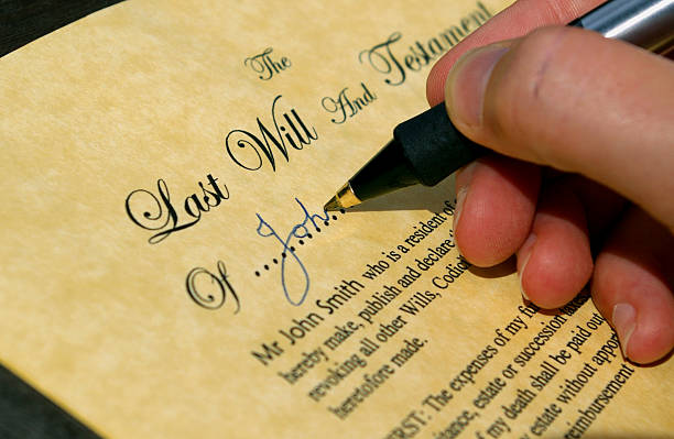 Signing a will stock photo