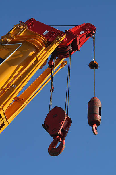 Extending crane jib with pulleys stock photo
